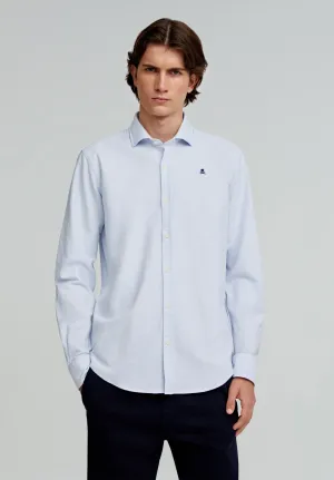 CAMISA OXFORD COM SKULL A CONTRASTAR